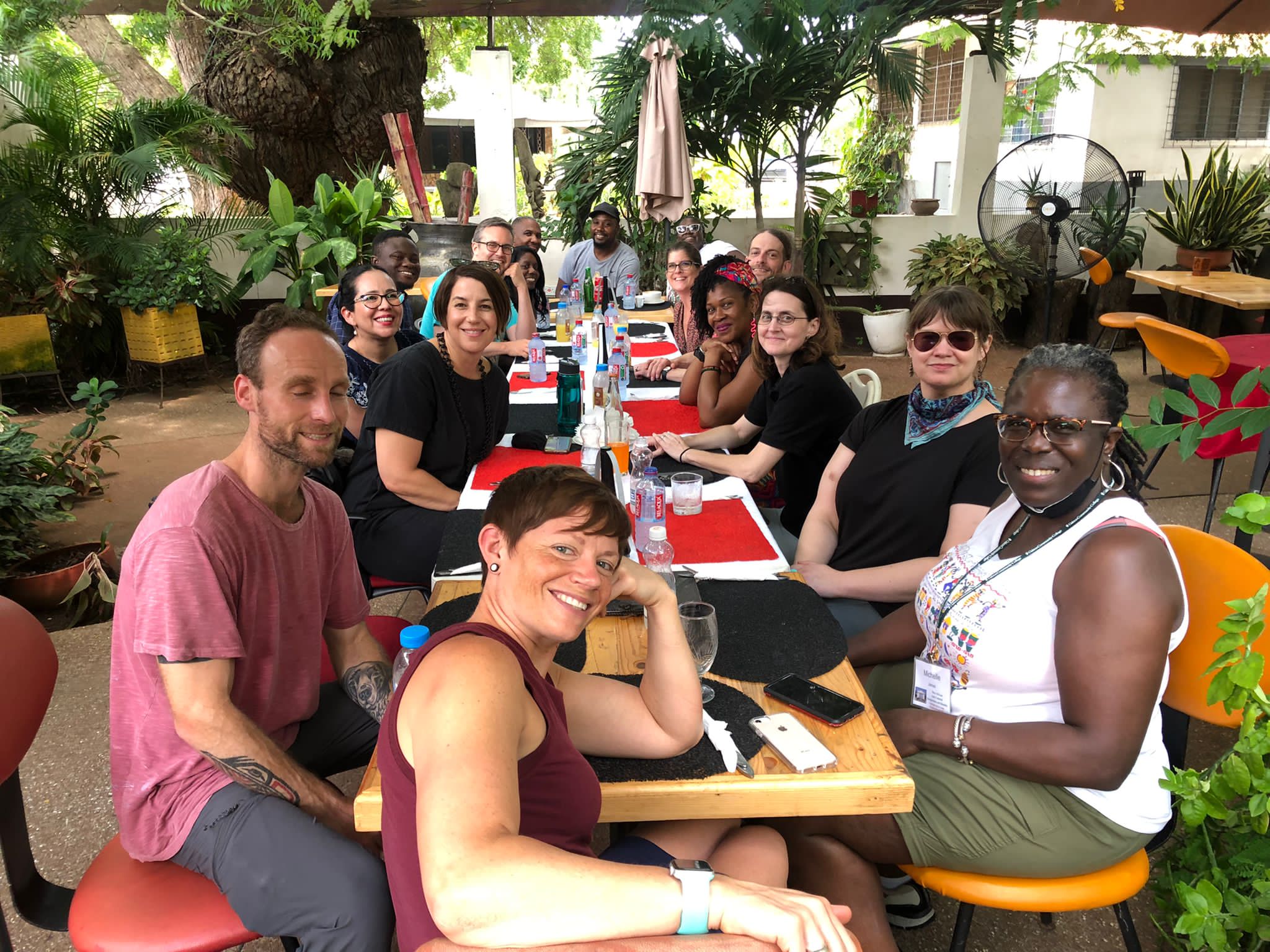 Lara Roemer and travel colleagues at dinner in Accra, Ghana