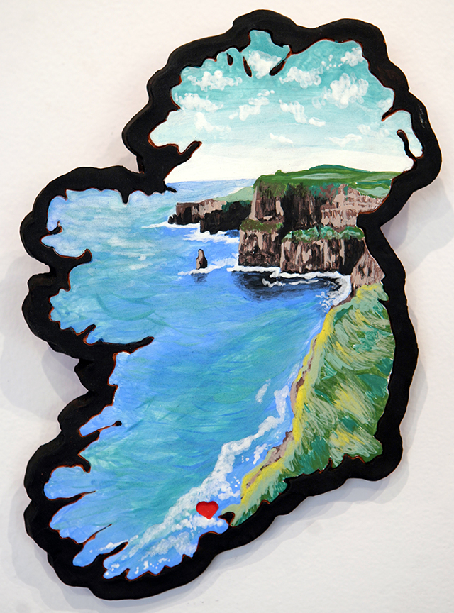 Mother, the silhouette of Ireland with the image of a coast land, cliffs and the sea.