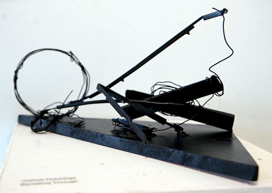 Sculpture of found objects, wire metal and wood.