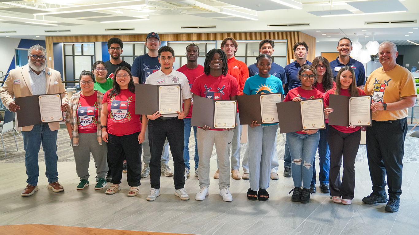 Students with copies of resolution and Rep. Dan Swanson