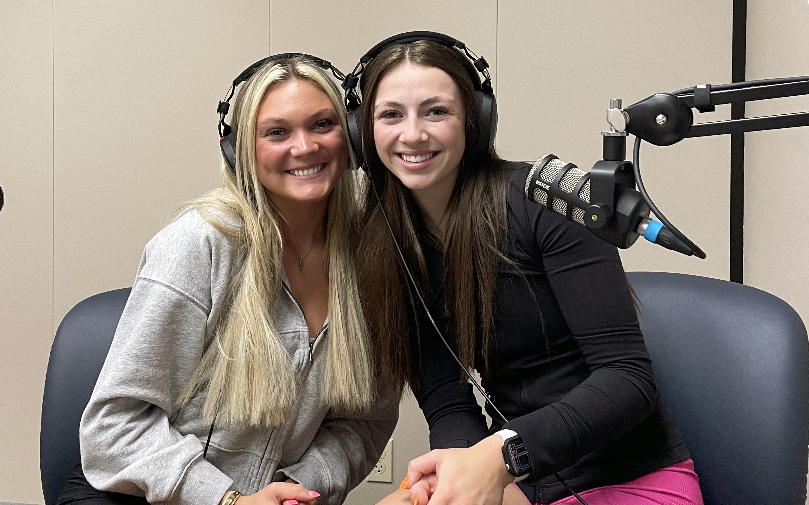Emma Schweigert and Abigail Shaffer in podcast studio.
