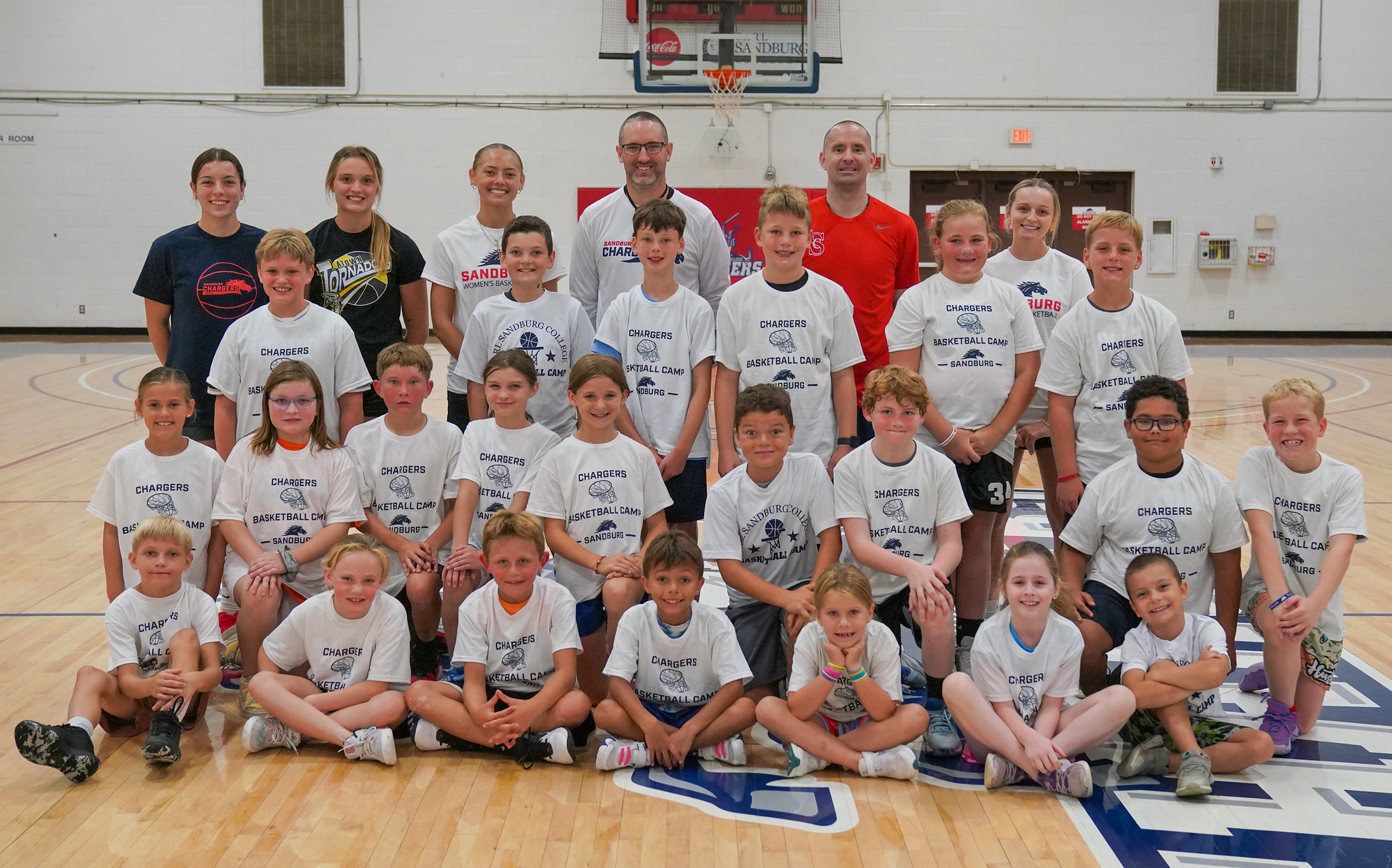 Group photo of basketball campers and coaches