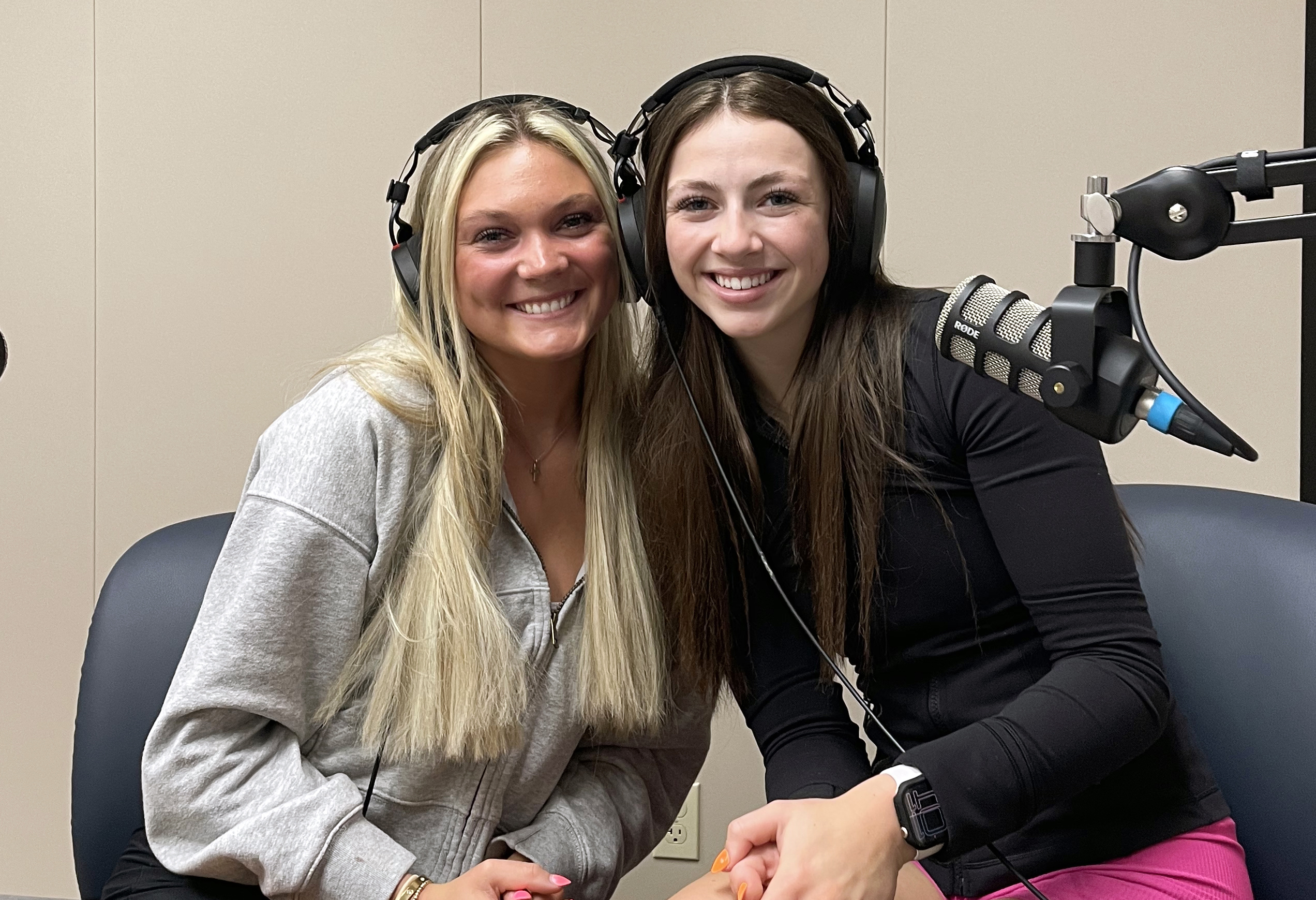 Emma Schweigert and Abigail Shaffer in podcast studio.