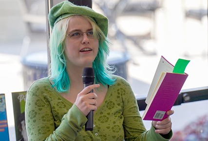 Women reading poetry.
