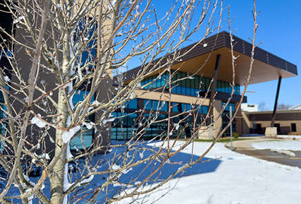 A view of S+T building with snow.