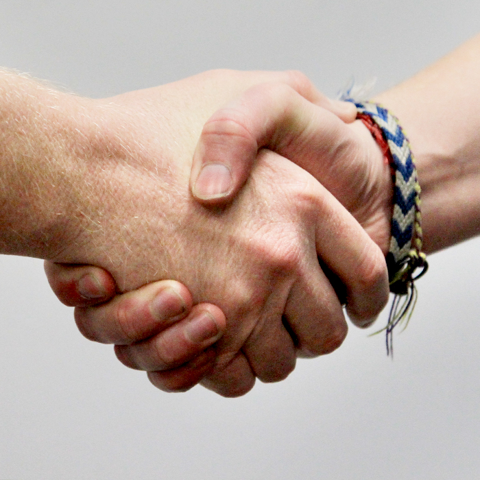 two people handshaking