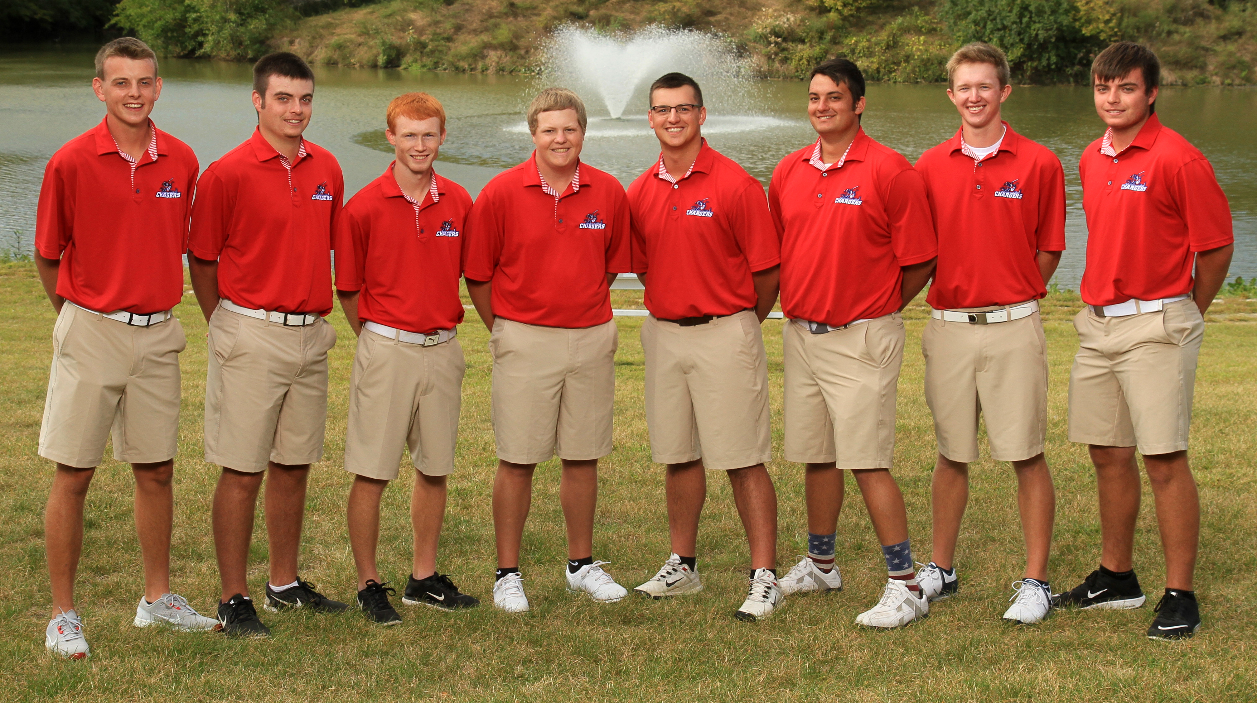 group of male students with their golf shirts on.