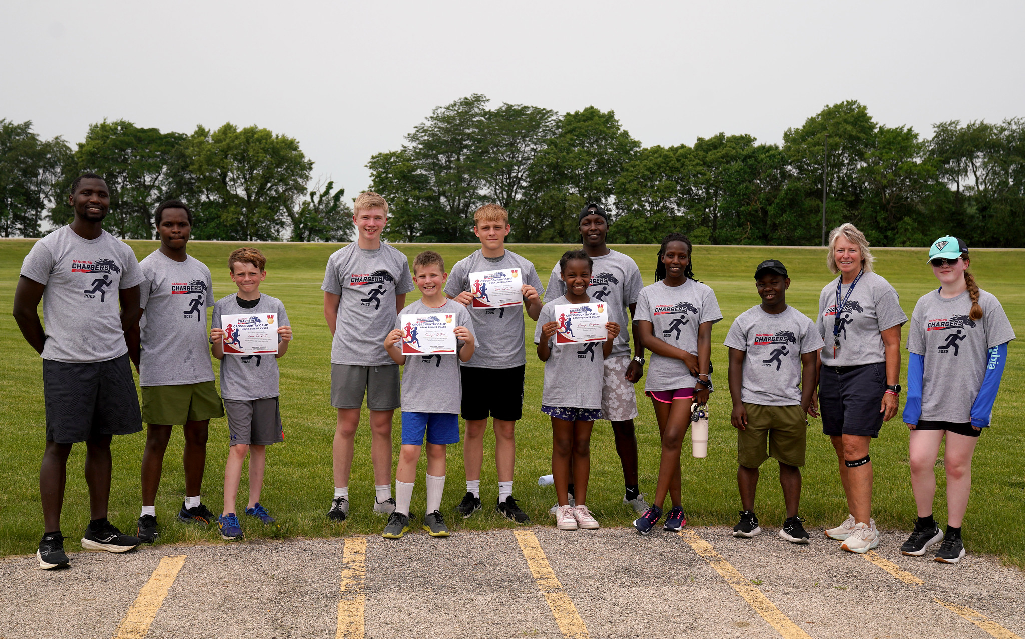 Group photo of youth cross country campers and leaders.