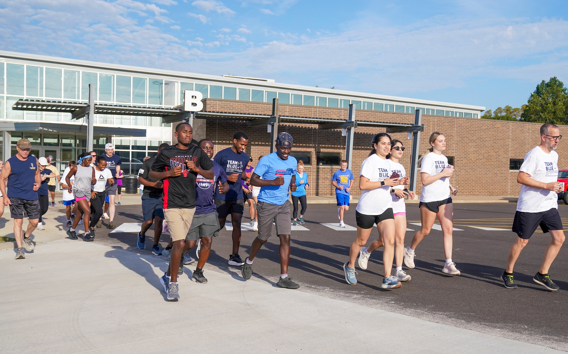 Runners at the Coach Rodney Blue Charitable Run